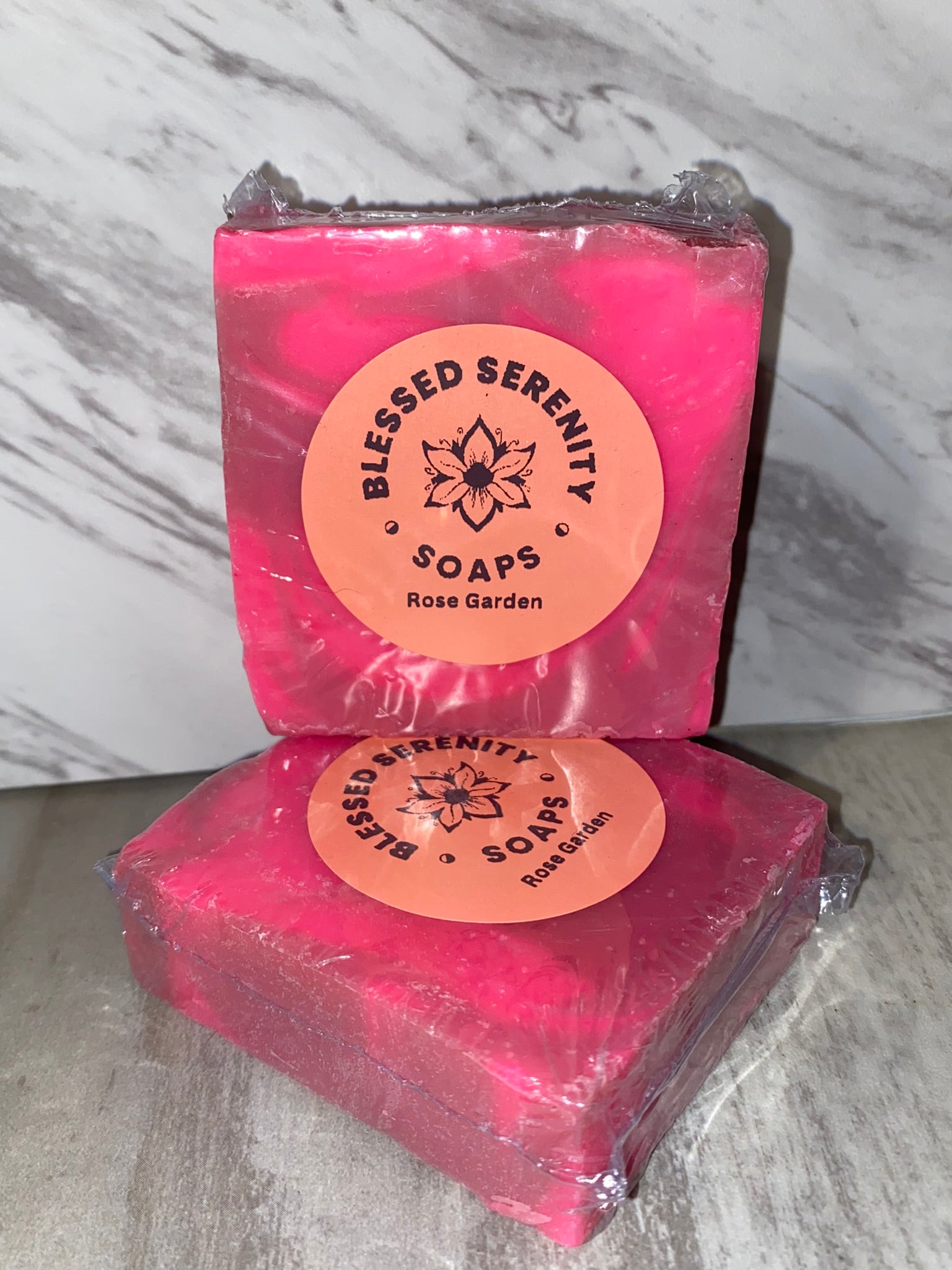 Two toned pink soap with pink label saying blessed Serenity Soaps rose garden